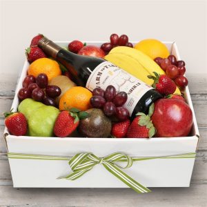 Fresh fruits box with Red wine.