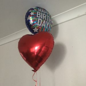 Birthday balloon with red heart